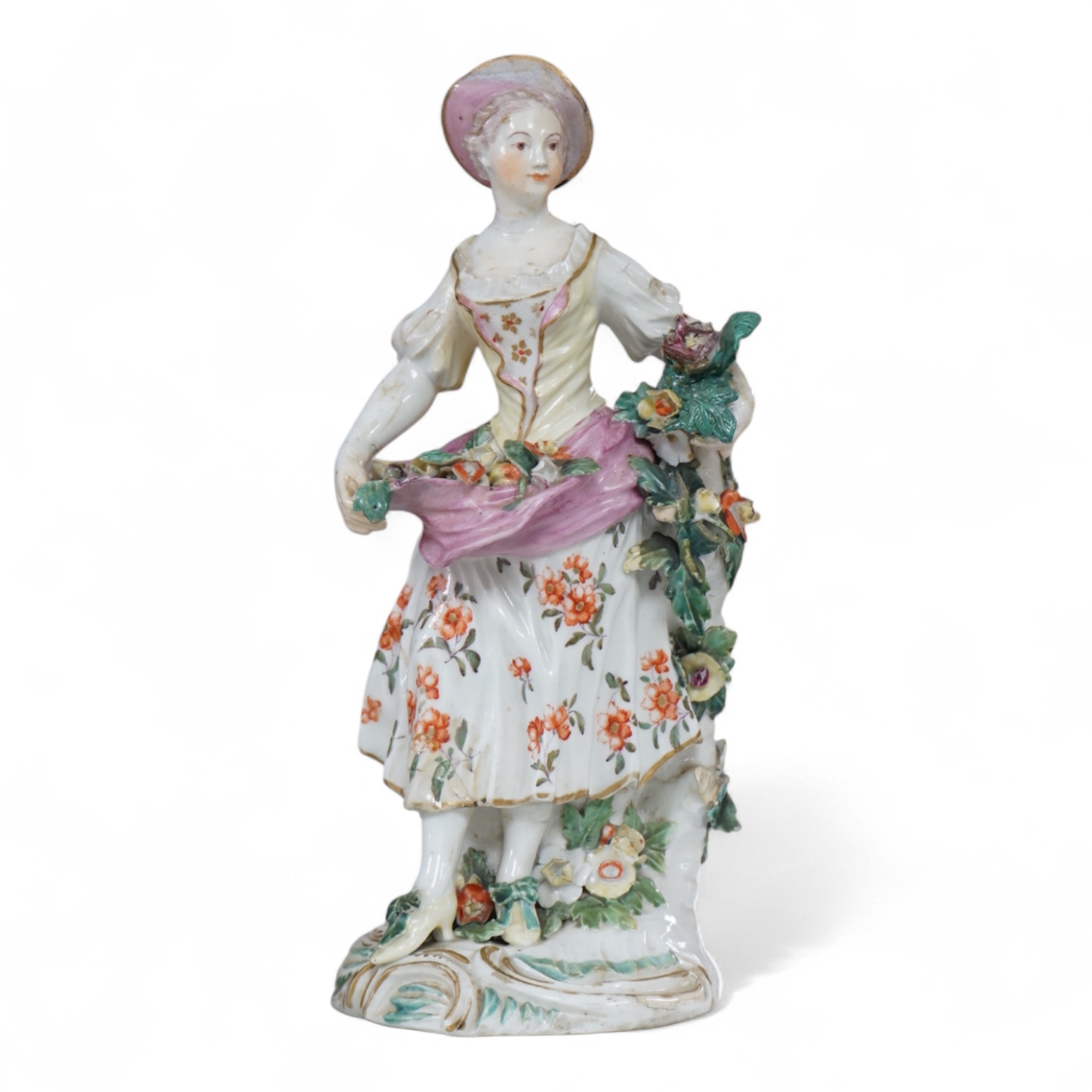 A Derby figure of a flower seller, c.1760, restored, 24cm high